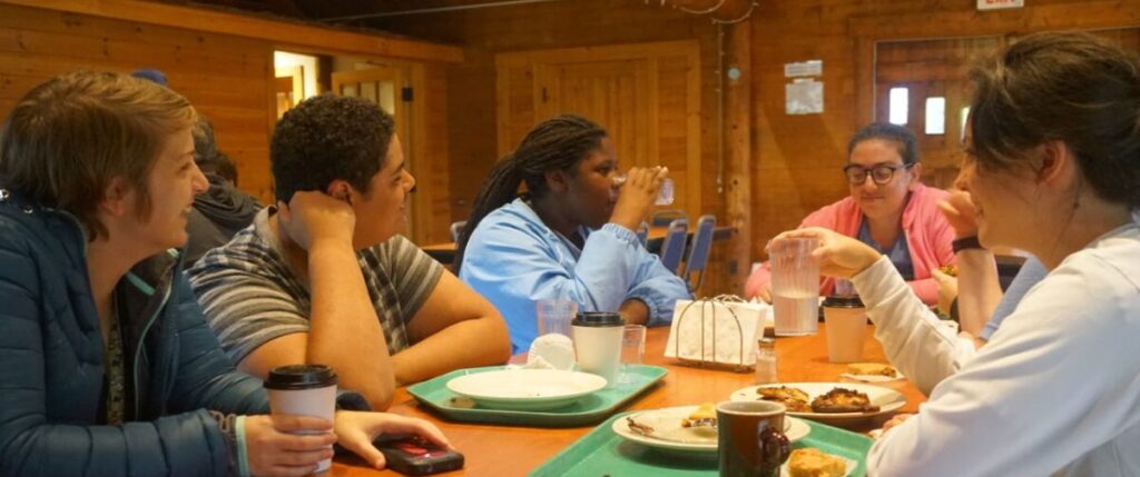 photo of people eating in dining area at schoodic institute