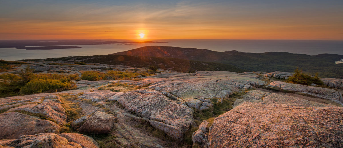 Warm sun hitting the mountain rock in Acadia National Park, Maine.
