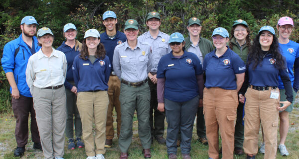 A group of Schoodic Education Adventure (SEA) program staff gather for a group photo