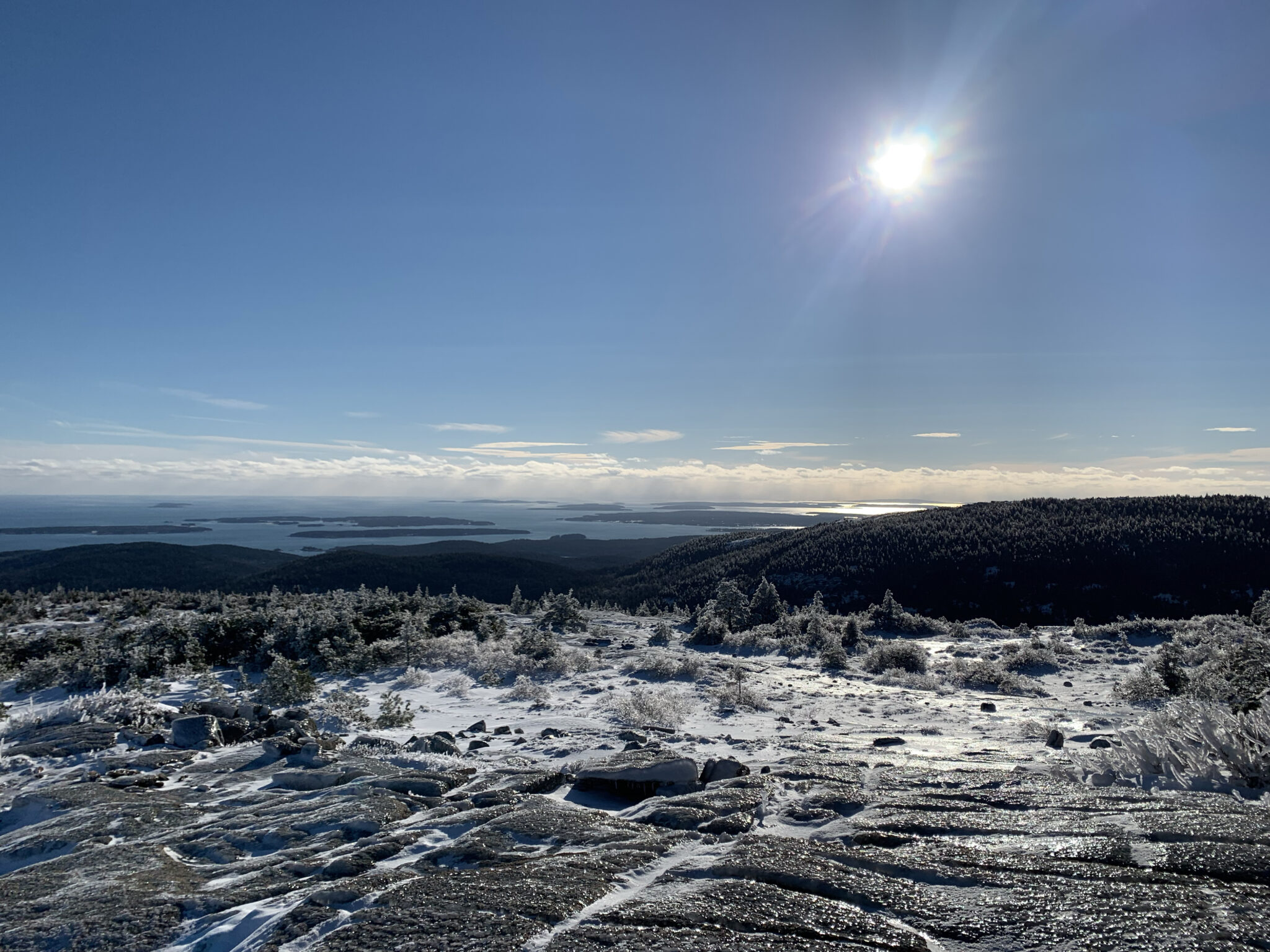 A sunny winter day on South Ridge Trail on Cadillac Mountain in Acadia