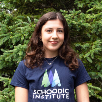 Natalie Portales poses for a photo while wearing a Schoodic Institute shirt