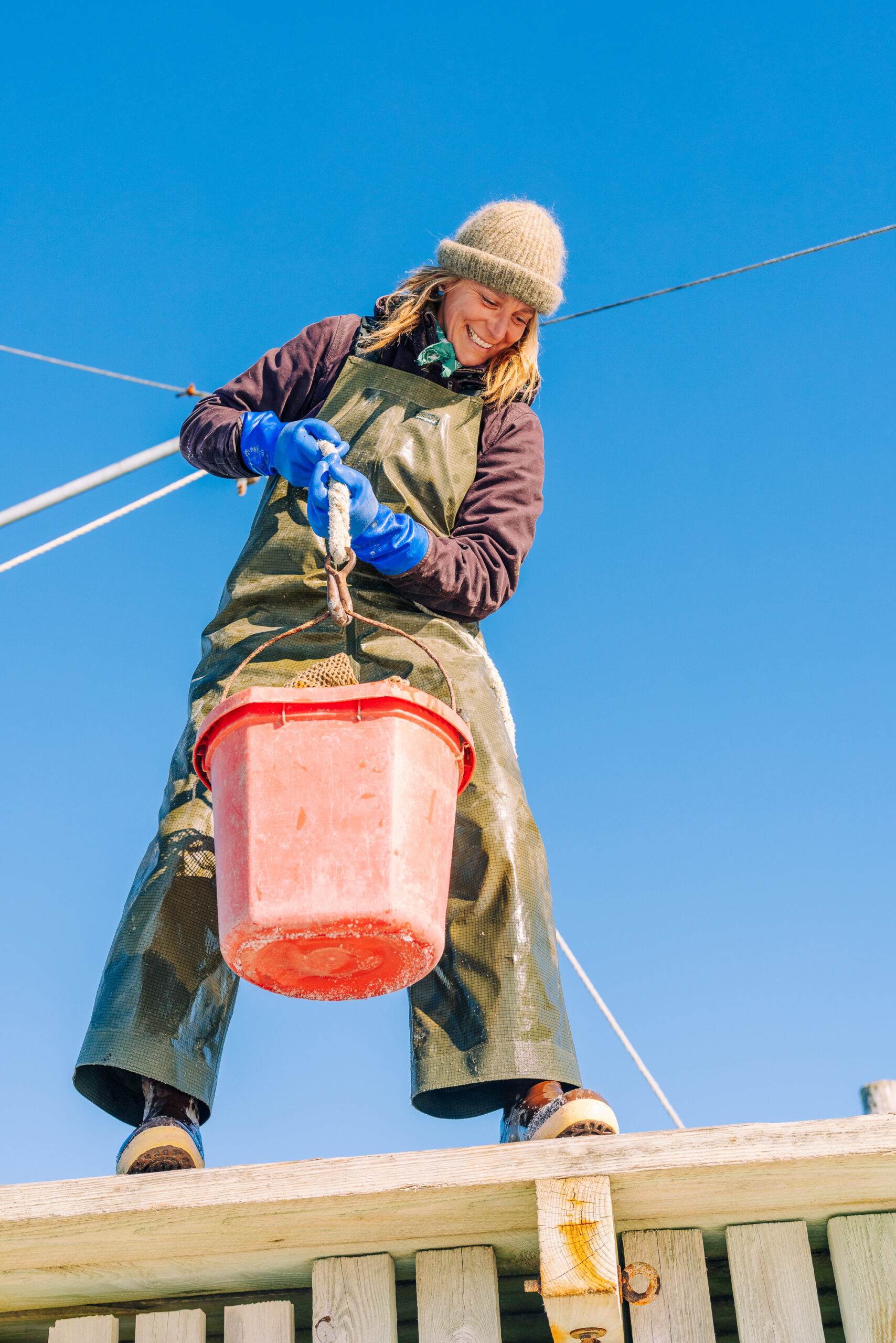 Abby Barrows lifts a bucket
